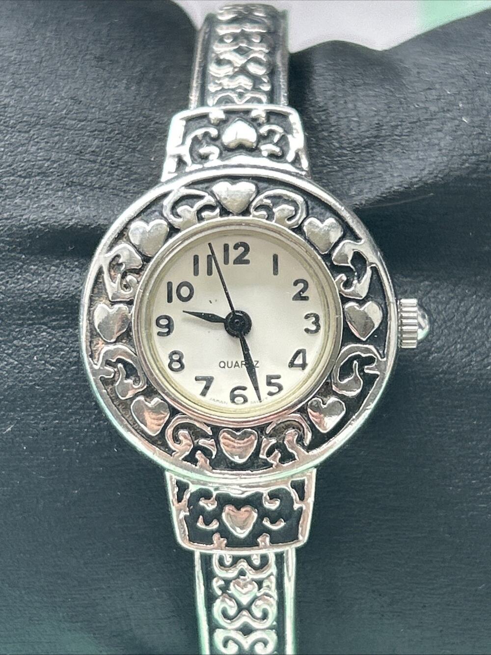 Avon Silver Tone Women’s Cuff Watch